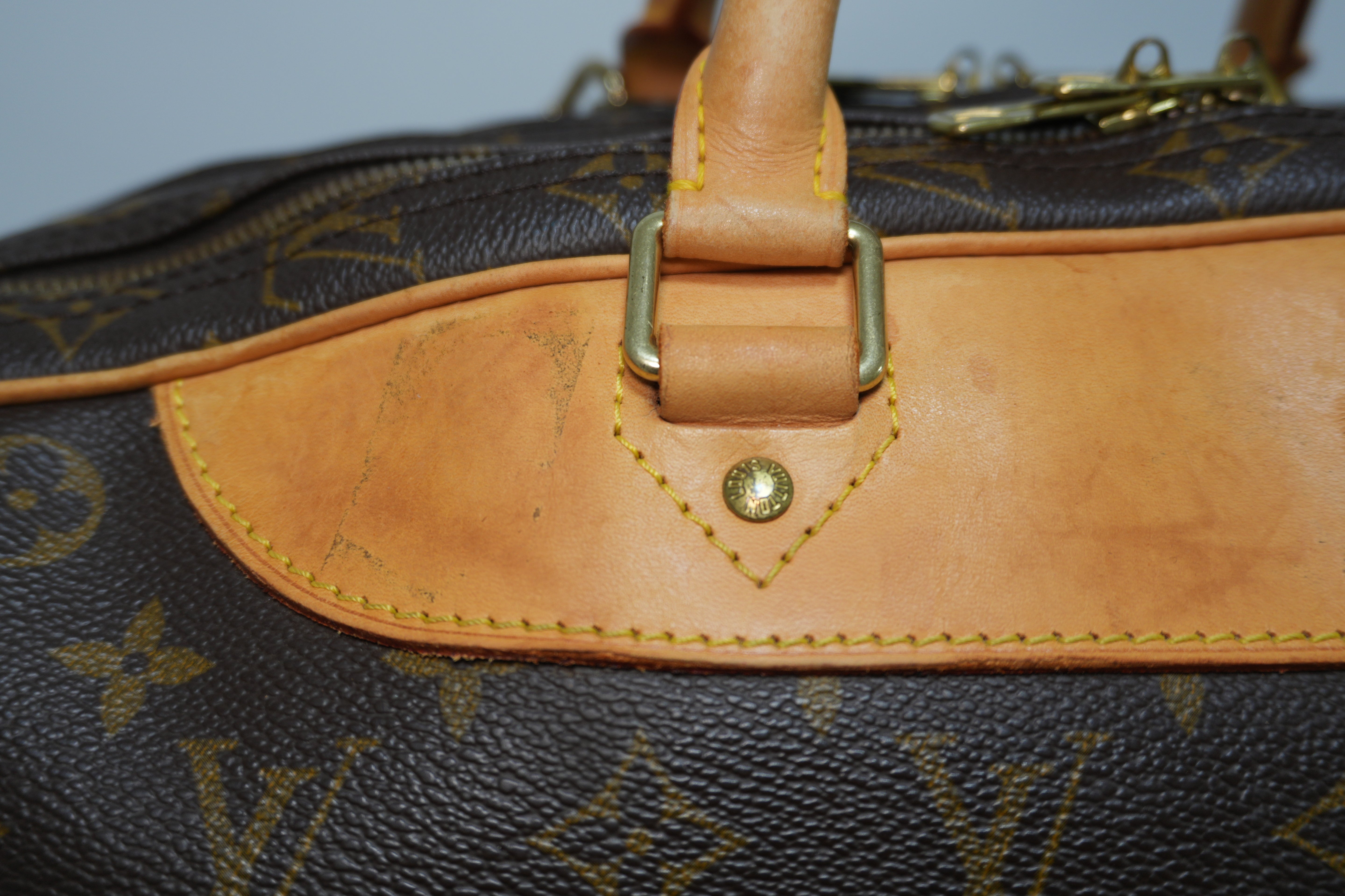 Louis Vuitton Alize 24 Travel Bag Used