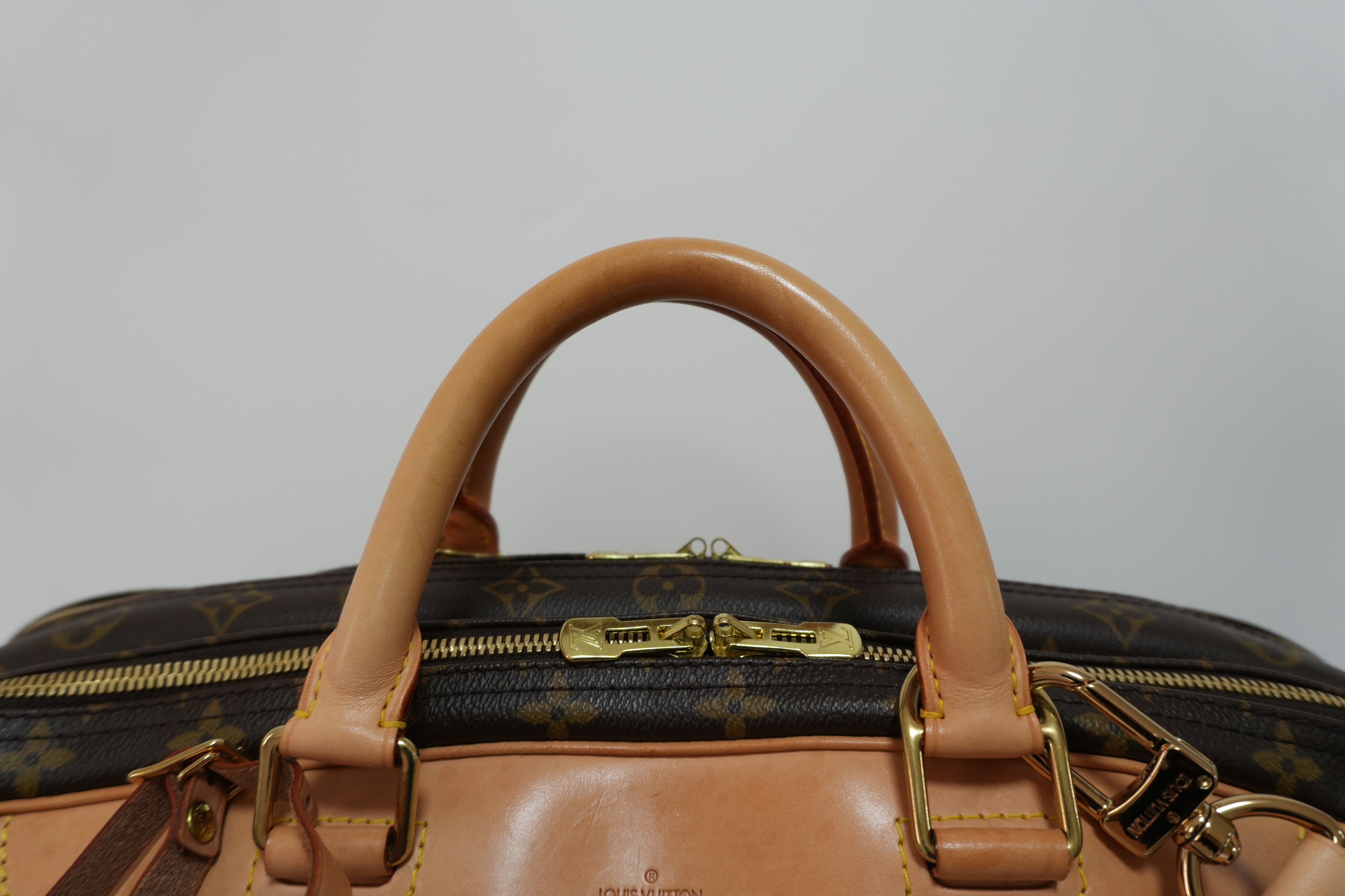 Louis Vuitton Alize Travel Bag Used