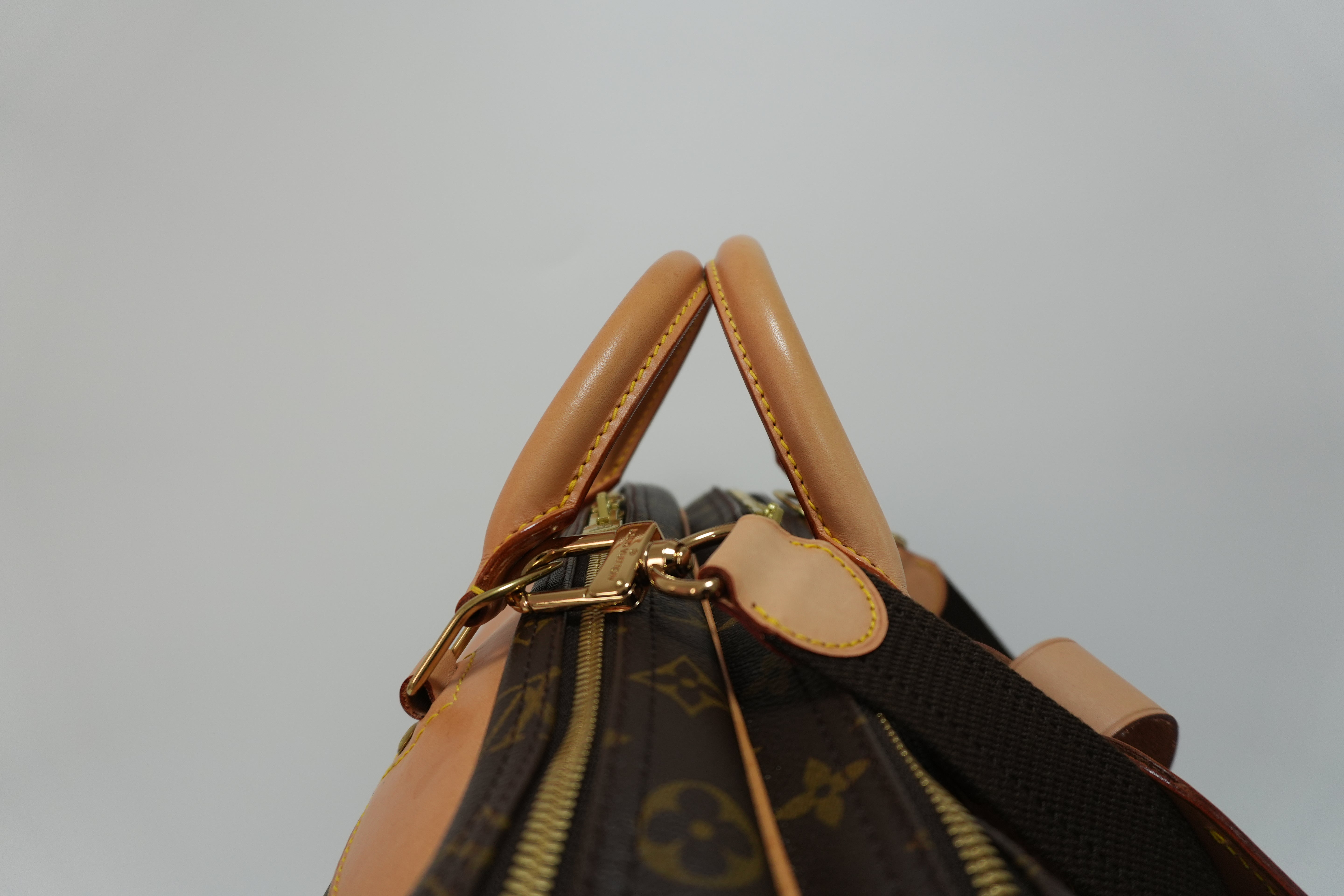 Louis Vuitton Alize Travel Bag Used