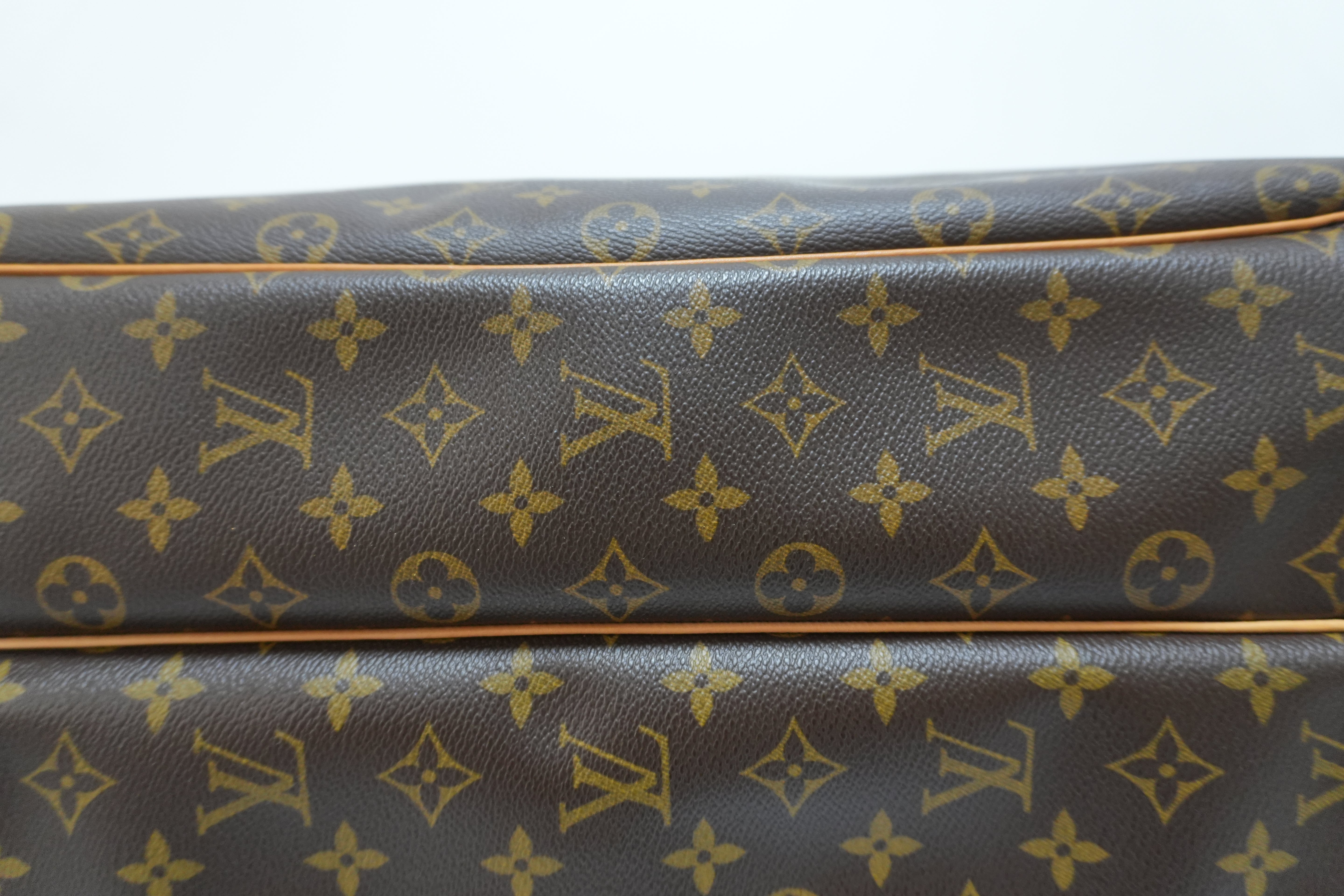 Louis Vuitton Alize Travel Bag Used