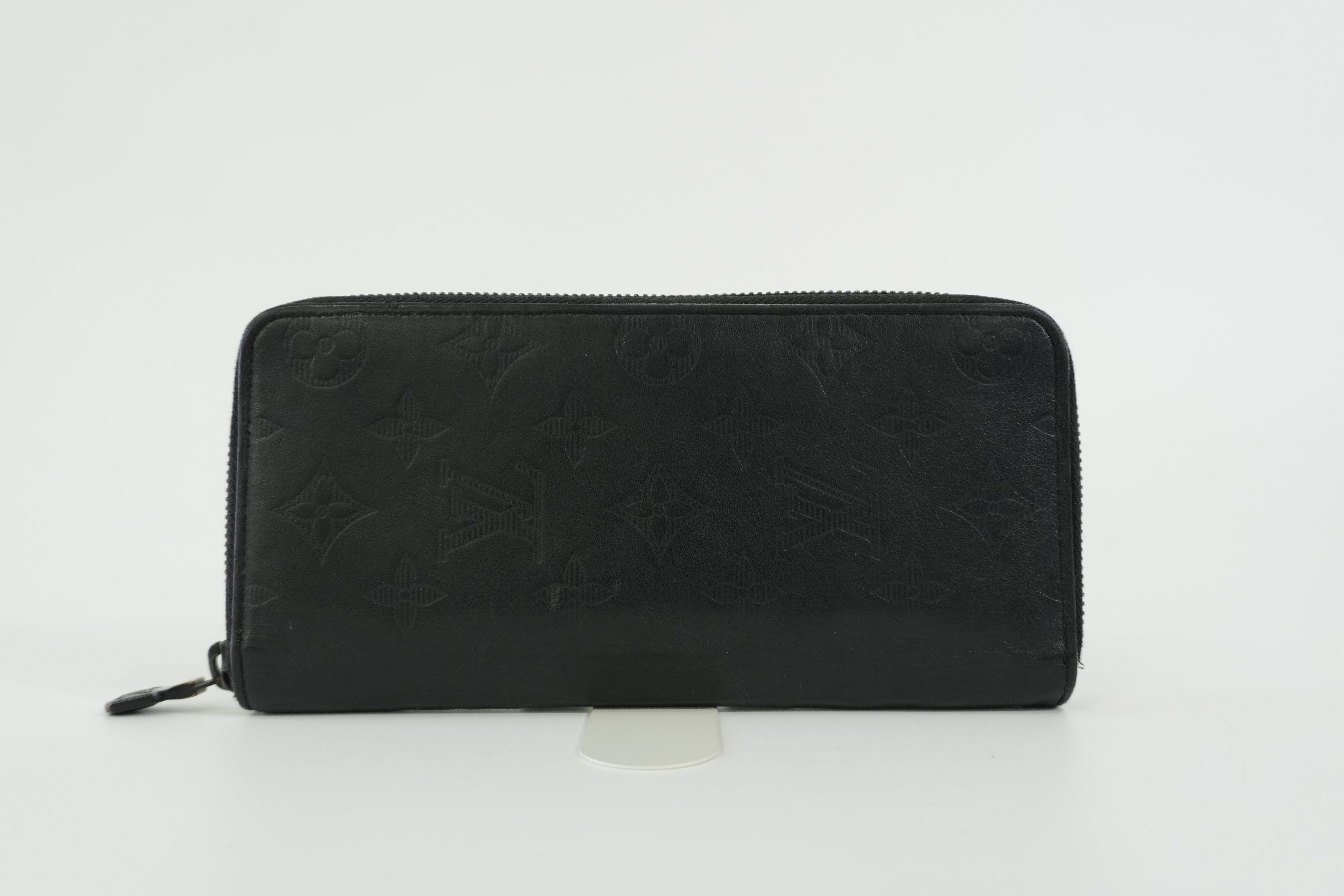 Pre-owned Louis Vuitton Shadow Monogram Vertical Zippy Wallet Black