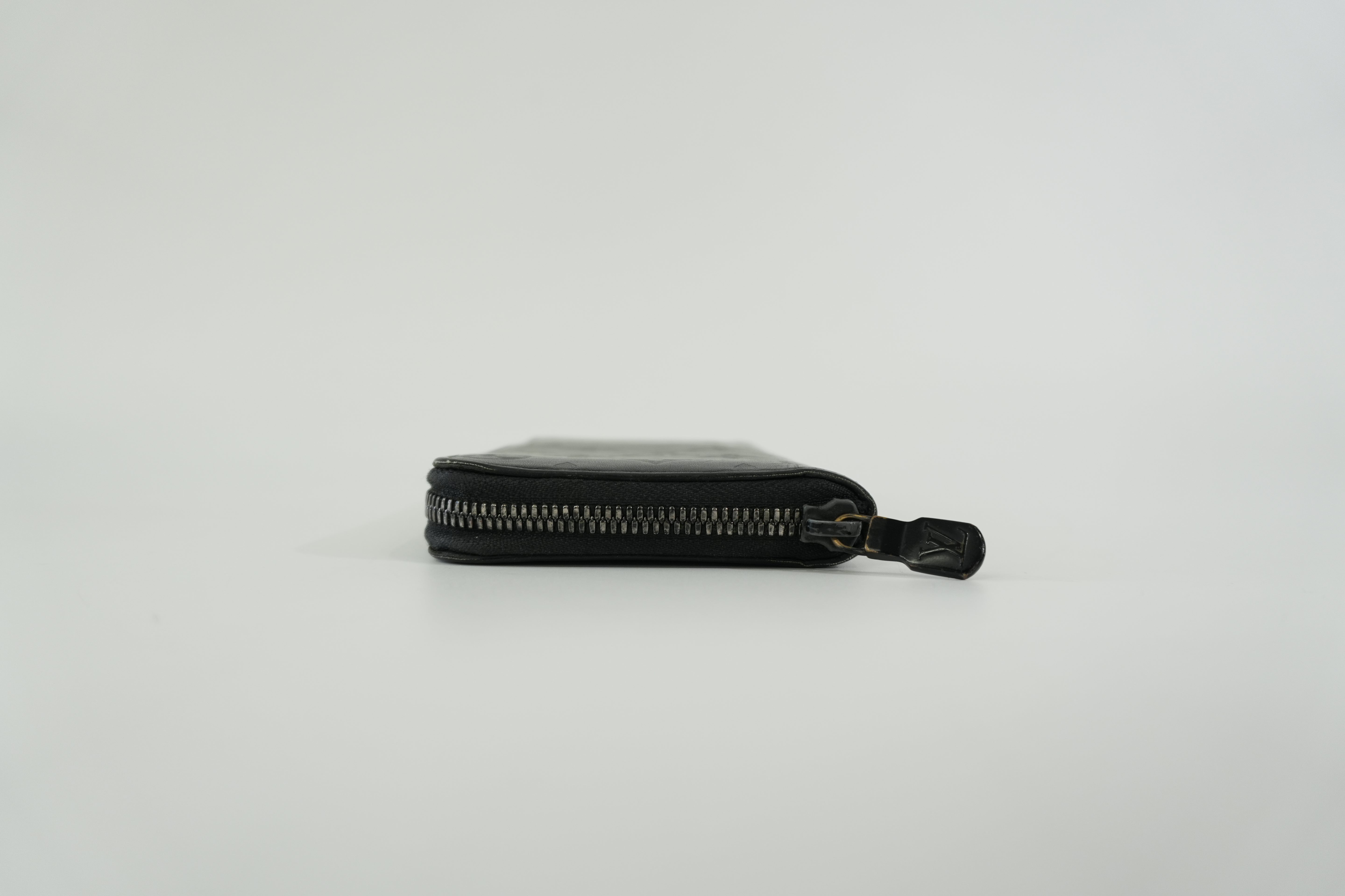 Pre-owned Louis Vuitton Shadow Monogram Vertical Zippy Wallet Black