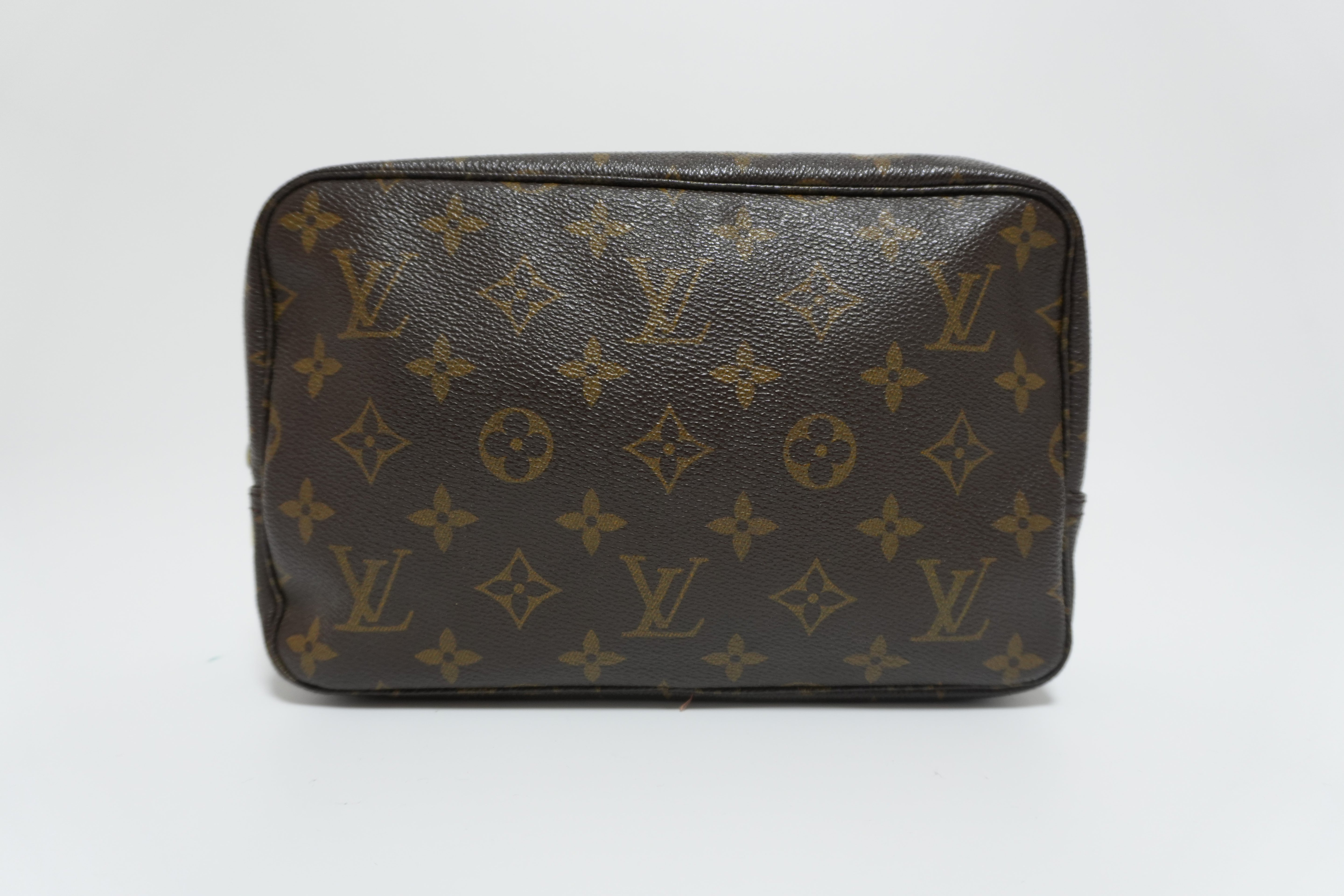 Louis Vuitton Monogram Trousse 23 Clutch Used