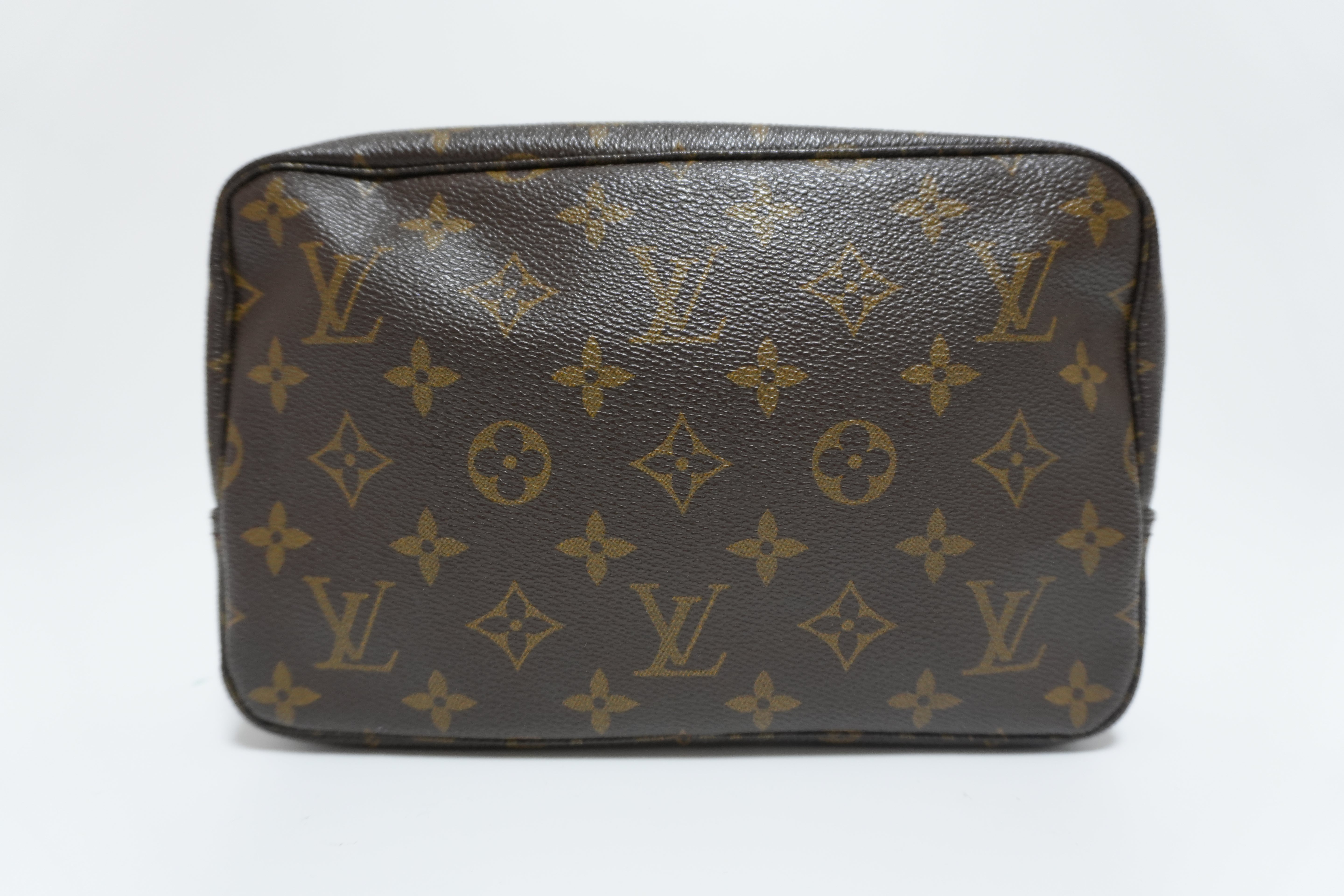 Louis Vuitton Monogram Trousse 23 Clutch Used