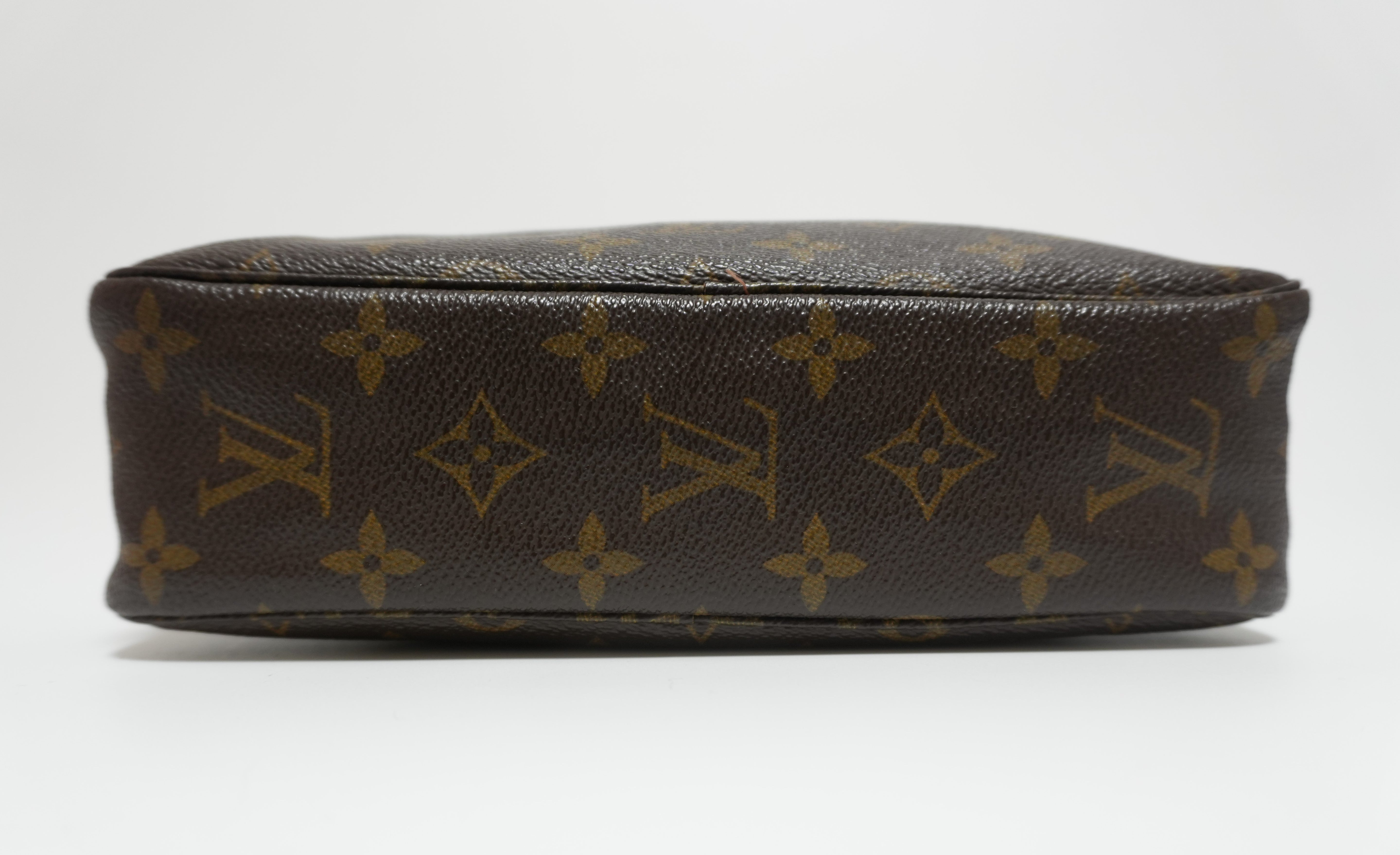 Louis Vuitton Monogram Trousse 23 Clutch Used