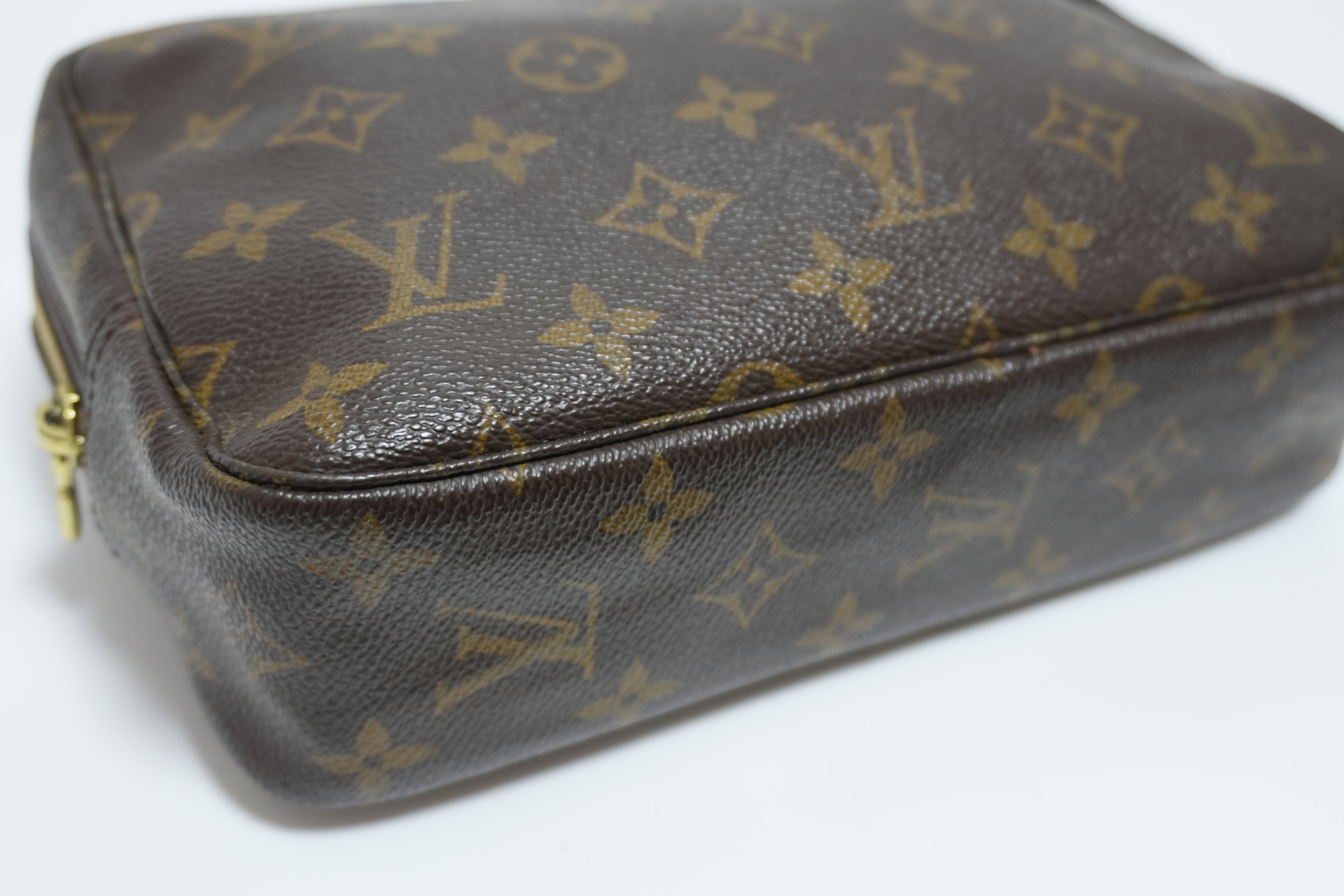 Louis Vuitton Monogram Trousse 23 Clutch Used