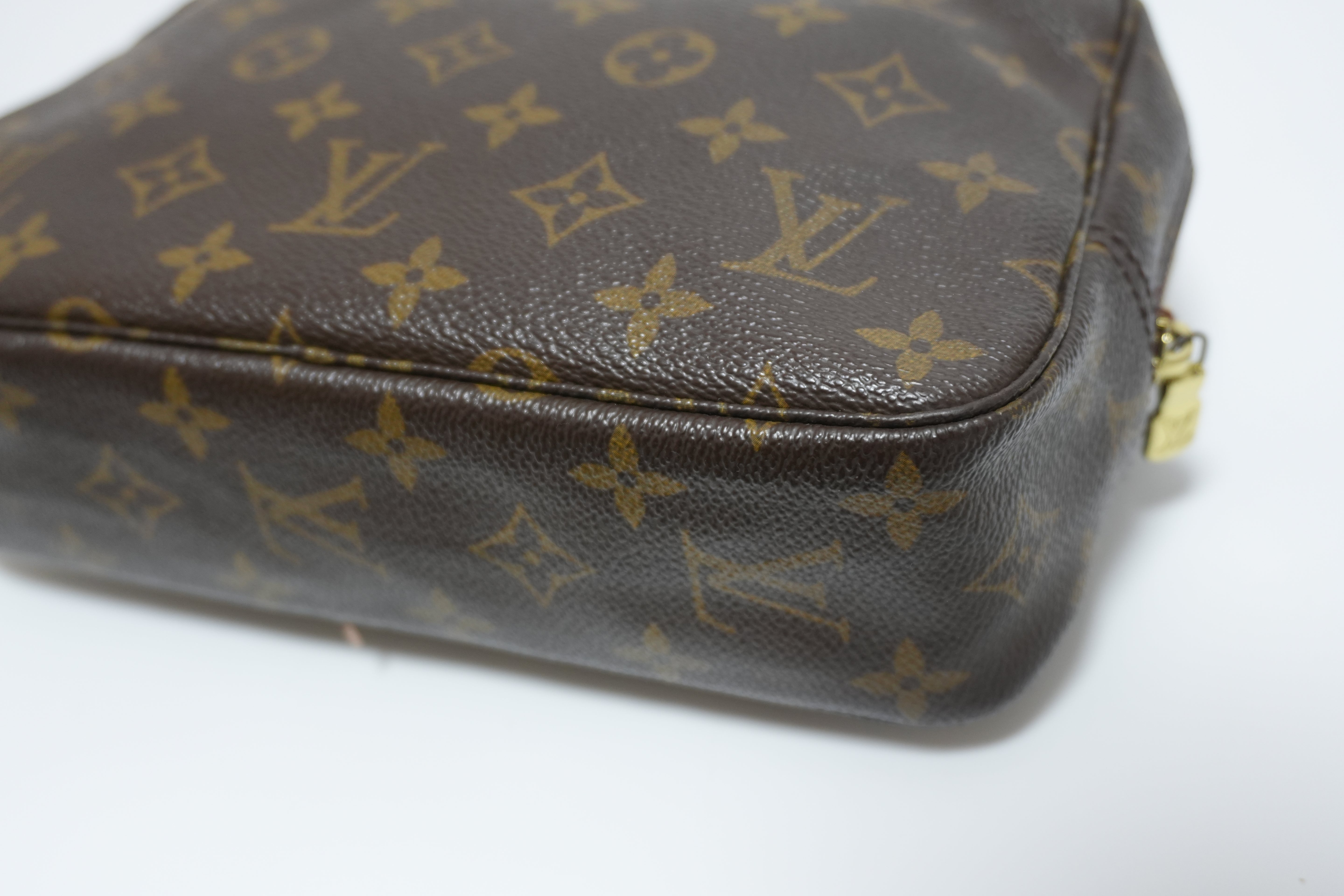 Louis Vuitton Monogram Trousse 23 Clutch Used