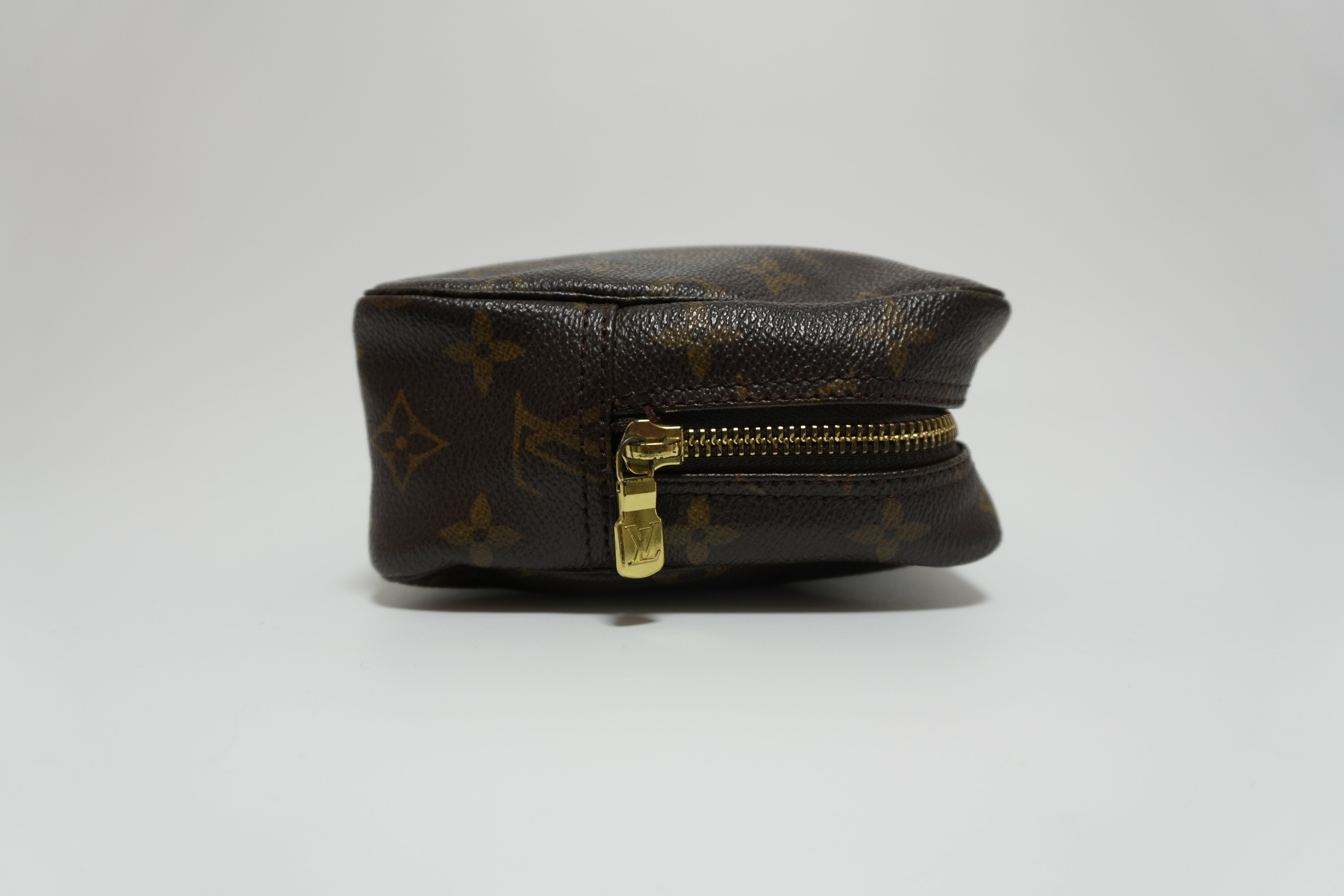 Louis Vuitton Monogram Trousse 23 Clutch Used