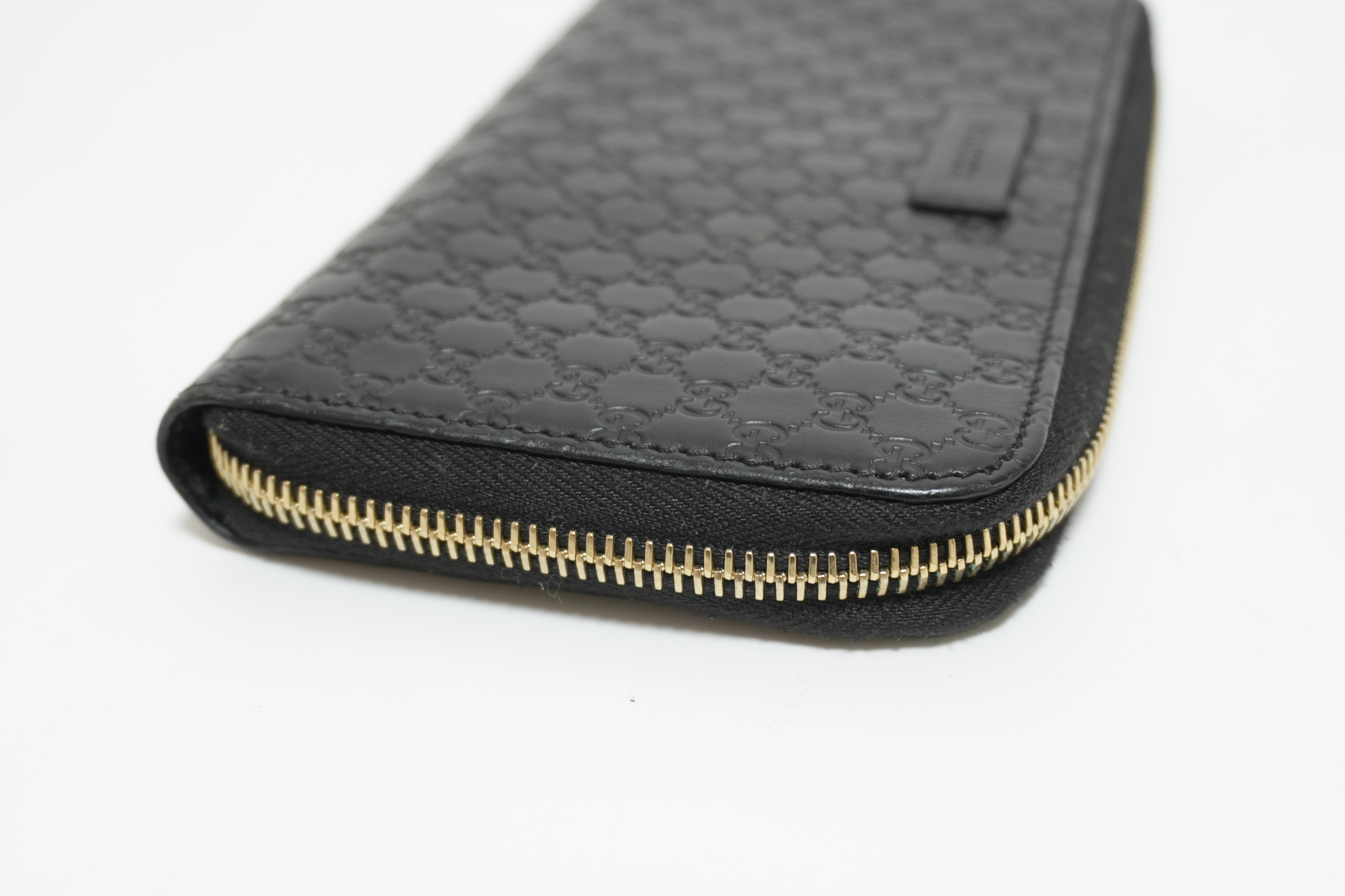 Gucci Micro Guccisima Zippy Wallet Black Leather Used