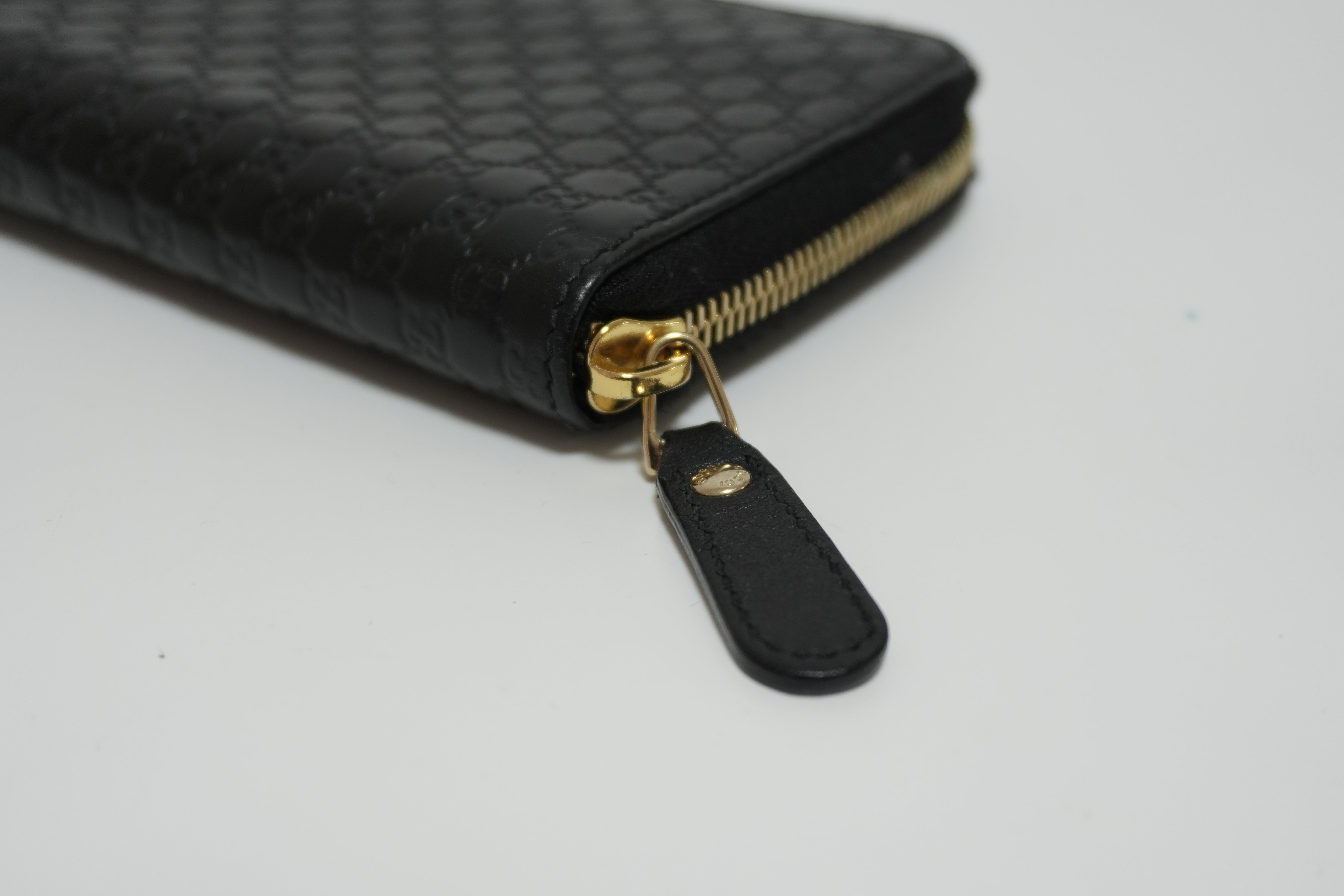 Gucci Micro Guccisima Zippy Wallet Black Leather Used