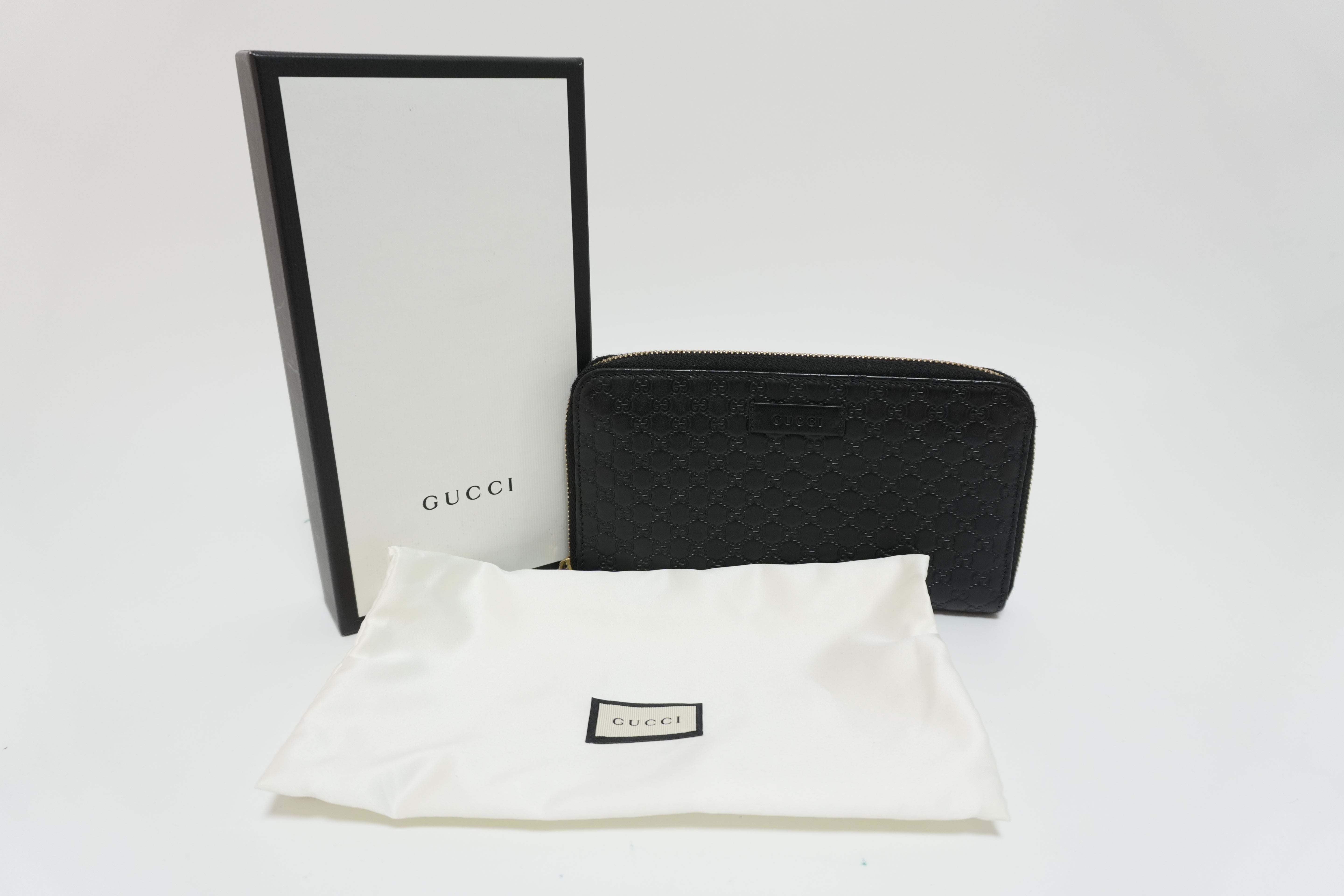 Gucci Micro Guccisima Zippy Wallet Black Leather Used