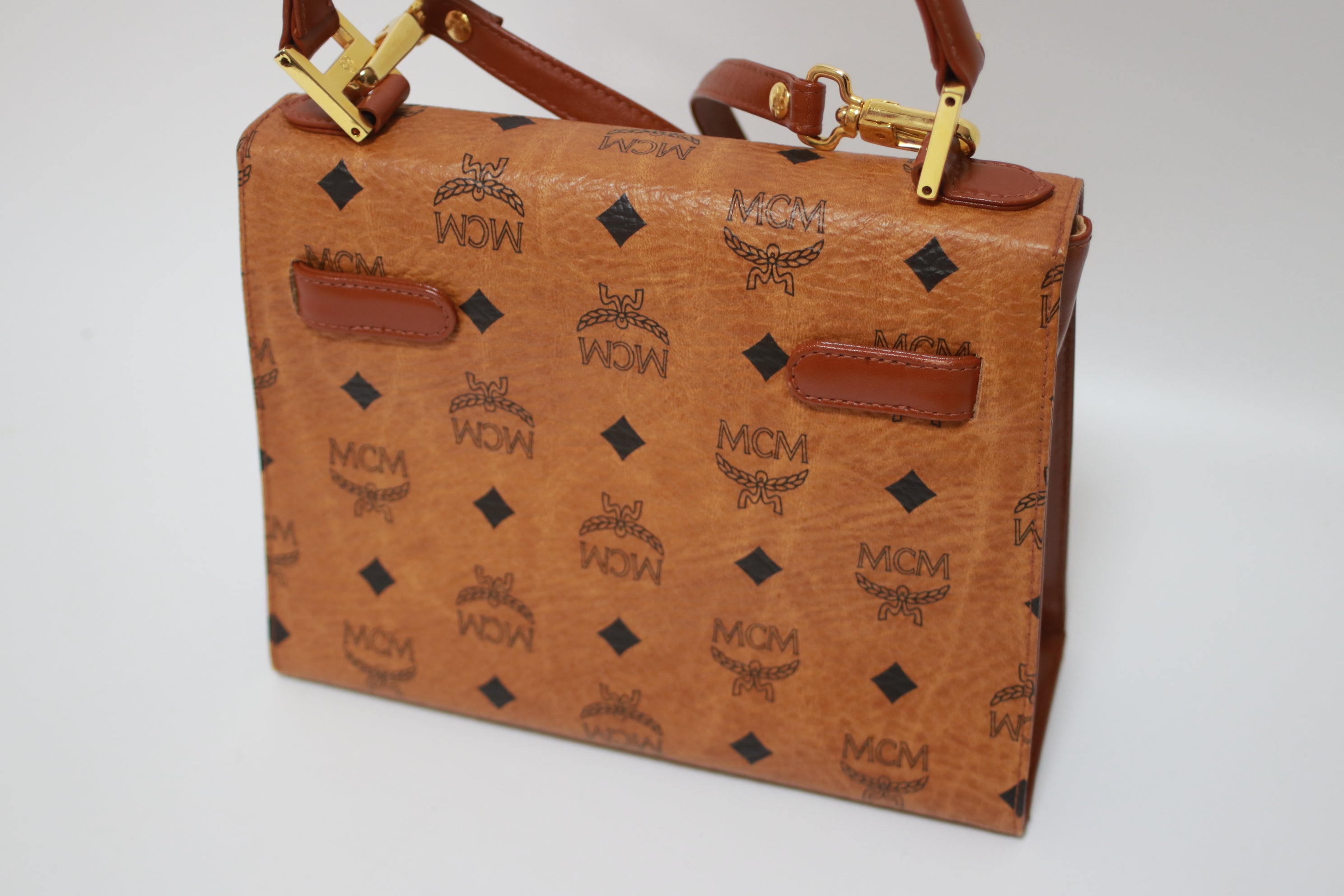 Mcm top handle bag best sale