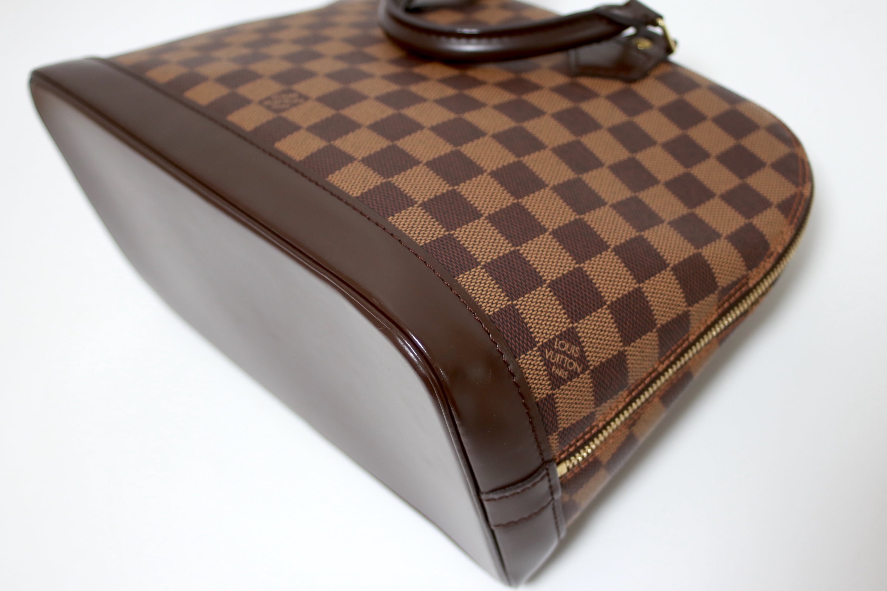 Louis Vuitton Alma Pm Damier Ebene Handbag