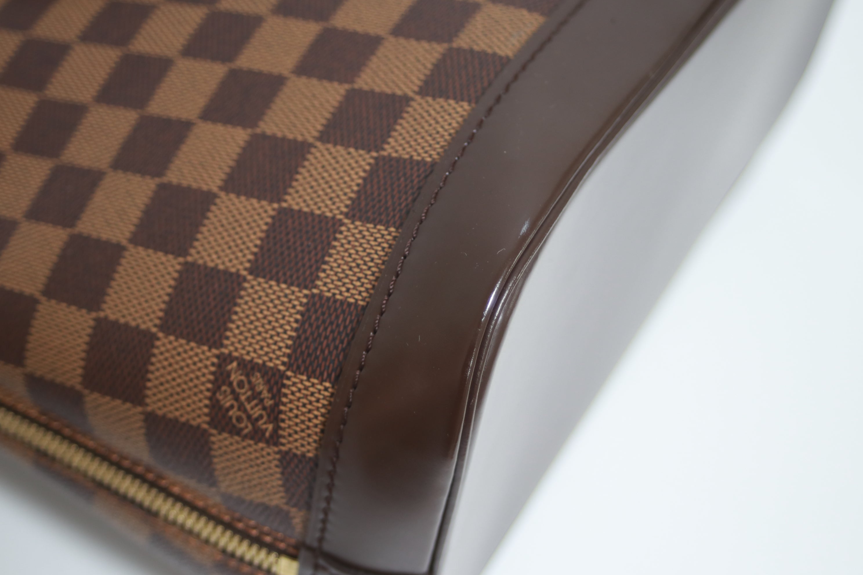 Louis Vuitton Alma Pm Damier Ebene Handbag