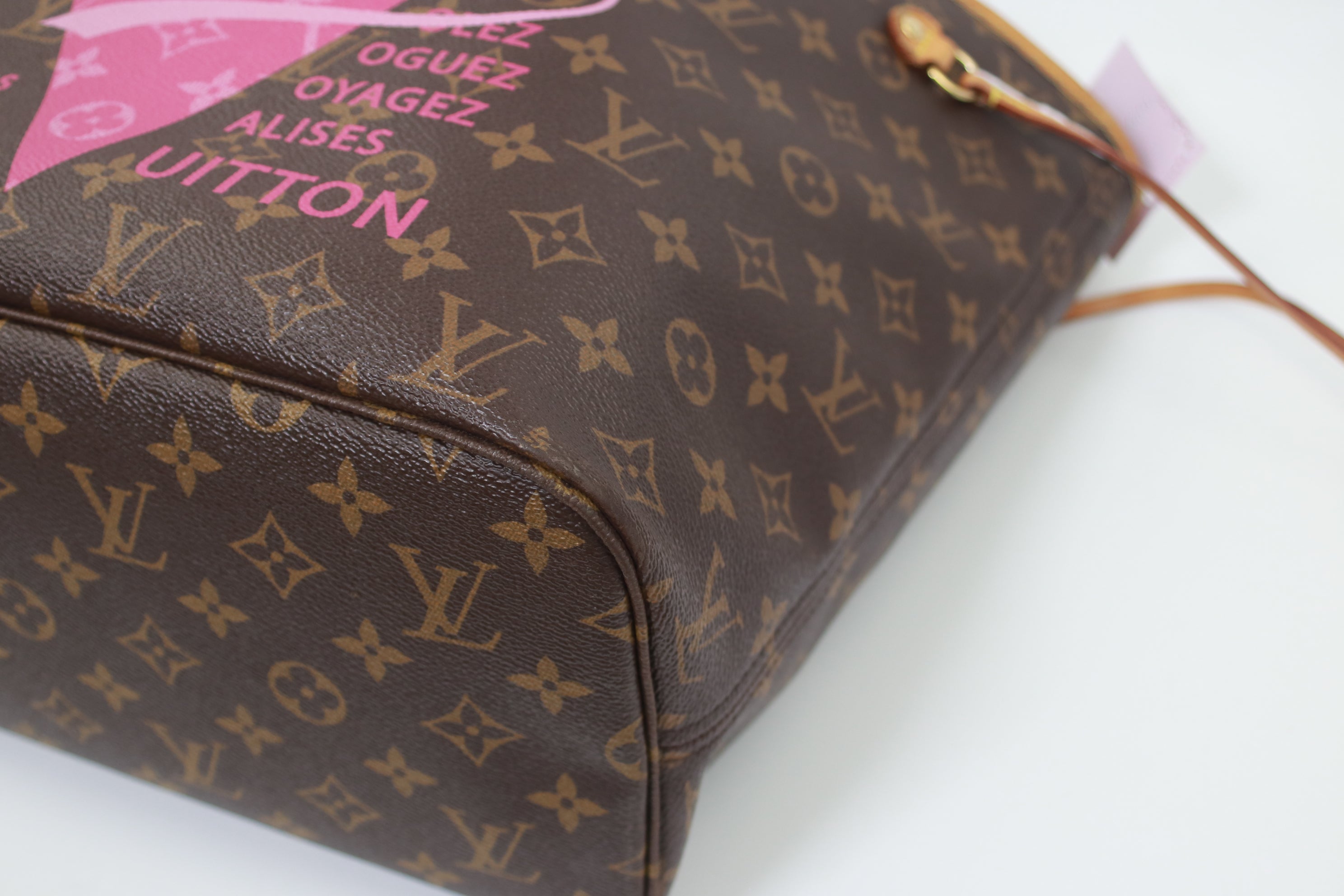 Used louis vuitton neverfull wristlet