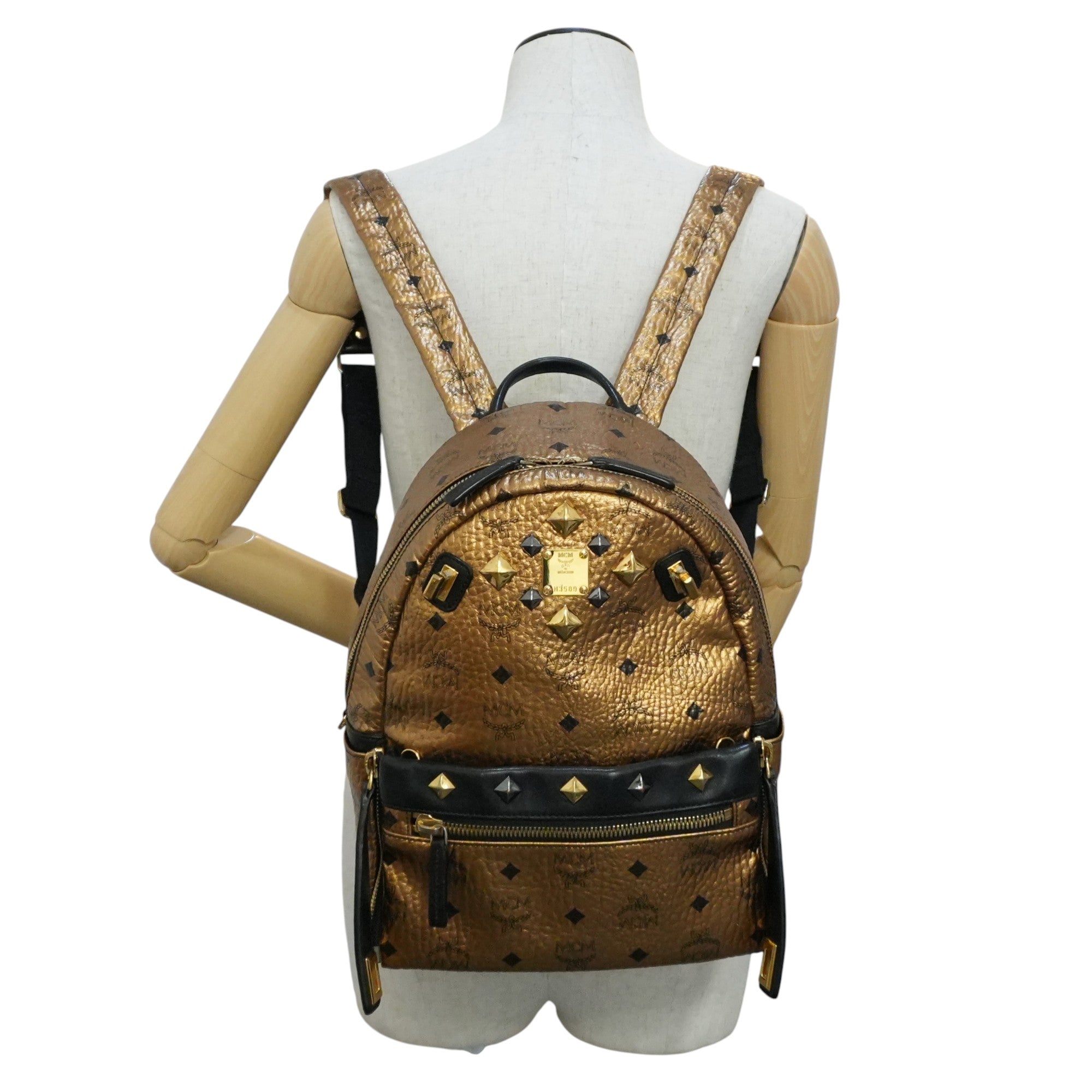 Pre-owned MCM Metallic Backpack with Detachable Pouch Gold